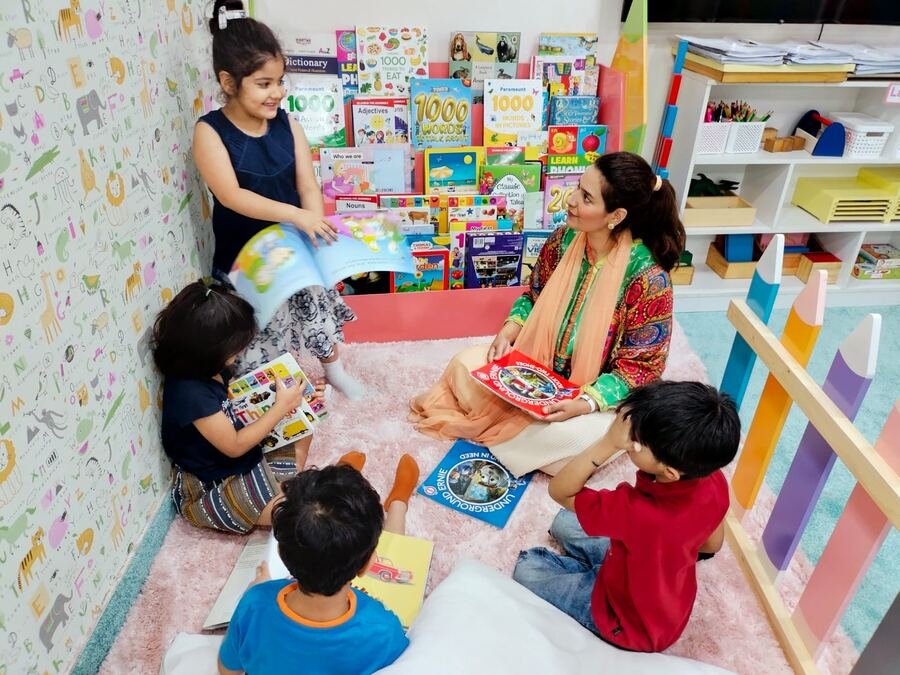 Teacher reading with children during story time